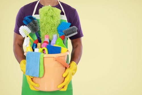 Carpet cleaners preparing equipment safely in Wimbledon