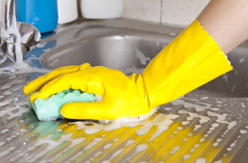 Deep cleaning kitchen details during end of tenancy work